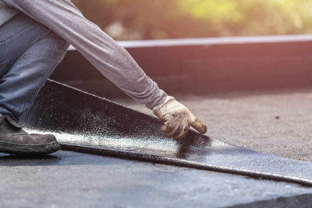 Professional Basement Waterproofing technician working in Fowler, MI